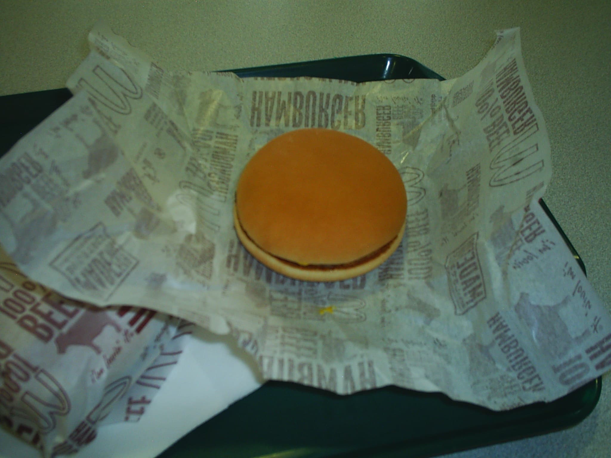 Freshly unwrapped McDonalds Hamburger Cover Image for McDonalds in Japan